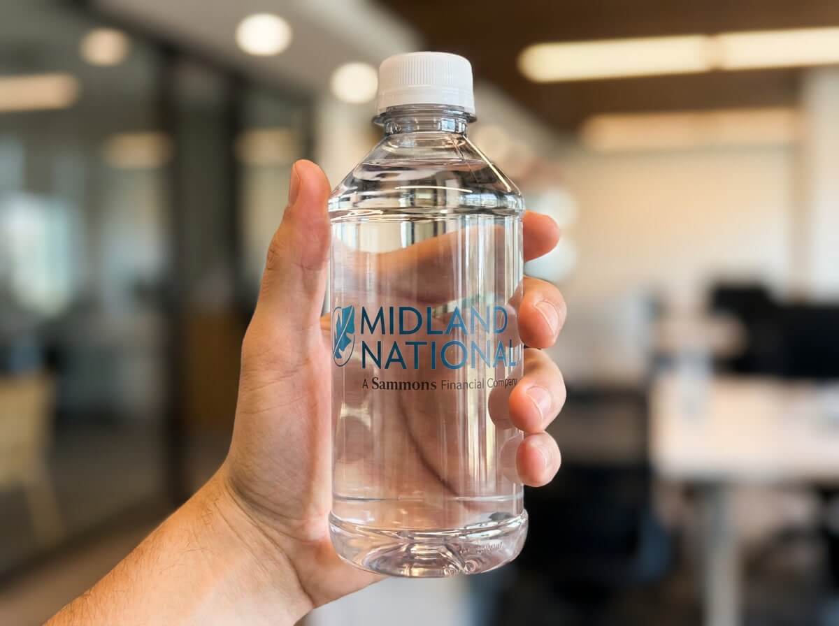 Custom-label sample bottle held in hand