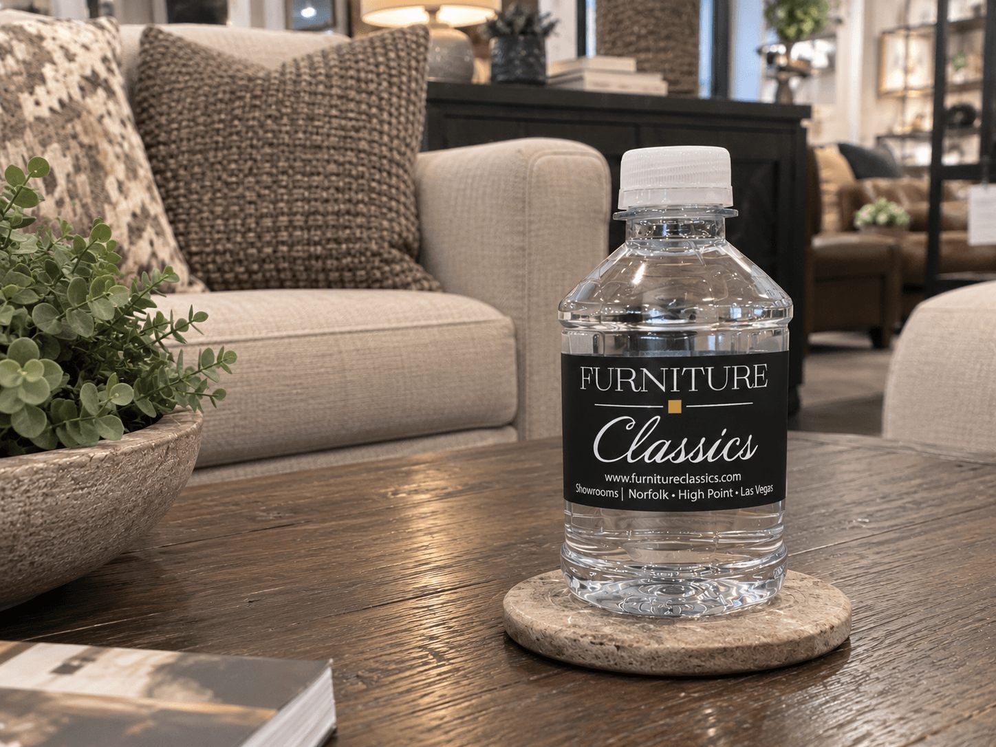 Furniture Classics bottle on a showroom coffee table